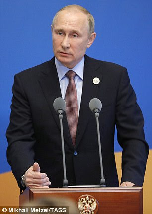 Putin speaks at an economic forum in China