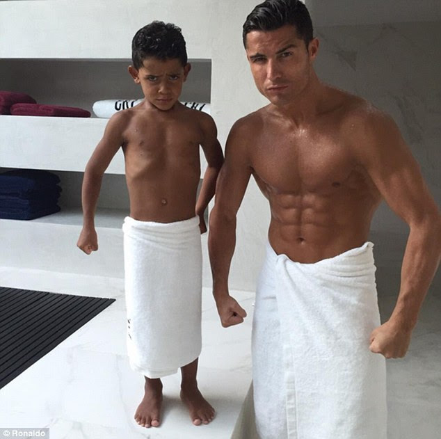 Like father, like son: Cristiano Ronaldo and his son Cristiano Jnr strike matching poses in a photo the star uploaded to his Instagram page