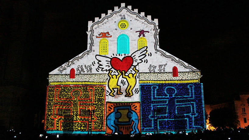 gloWArp revives an italian cathedral by projecting images on its façade