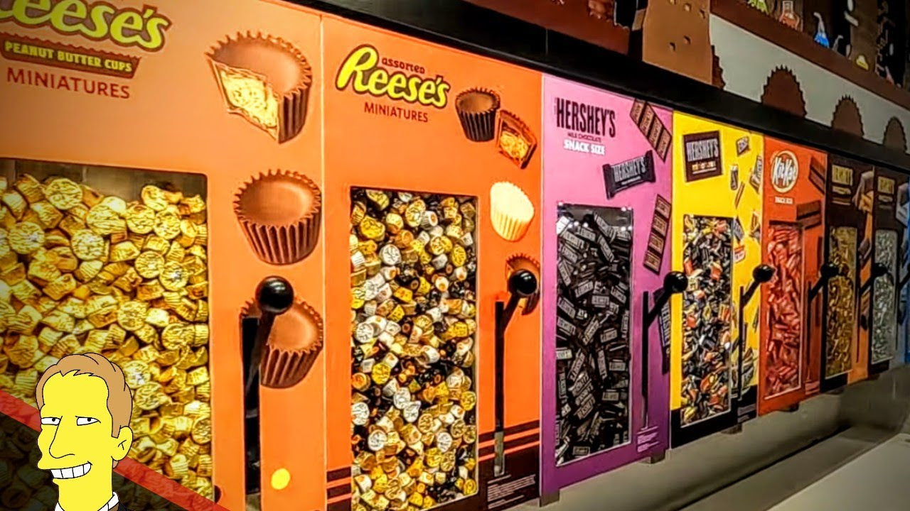 Hersheys chocolate world wall of candy dispensers for Reese Peanut Butter Cups and other Hershey candies