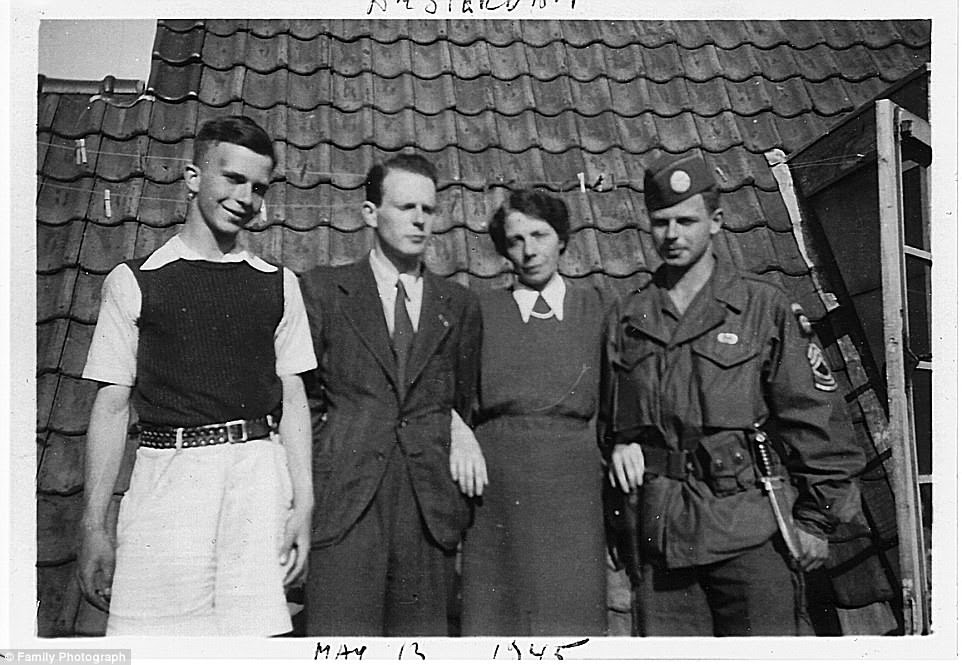 Ritchie Boy and U.S. paratrooper Werner Angress reunited with his mother and brothers, Hans and Fritz (left to right) in Amsterdam on Mother¿s Day 1945. His father died in Auschwitz concentration camp after being convicted of trying to smuggle money out of Germany