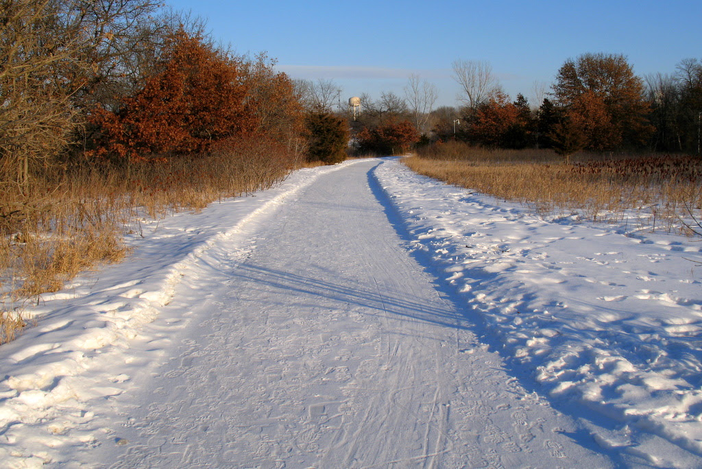 Snow covered walking paths in Vermillion Falls Park, Hastings, Minnesota are one place you can walking during the winter months of the year.