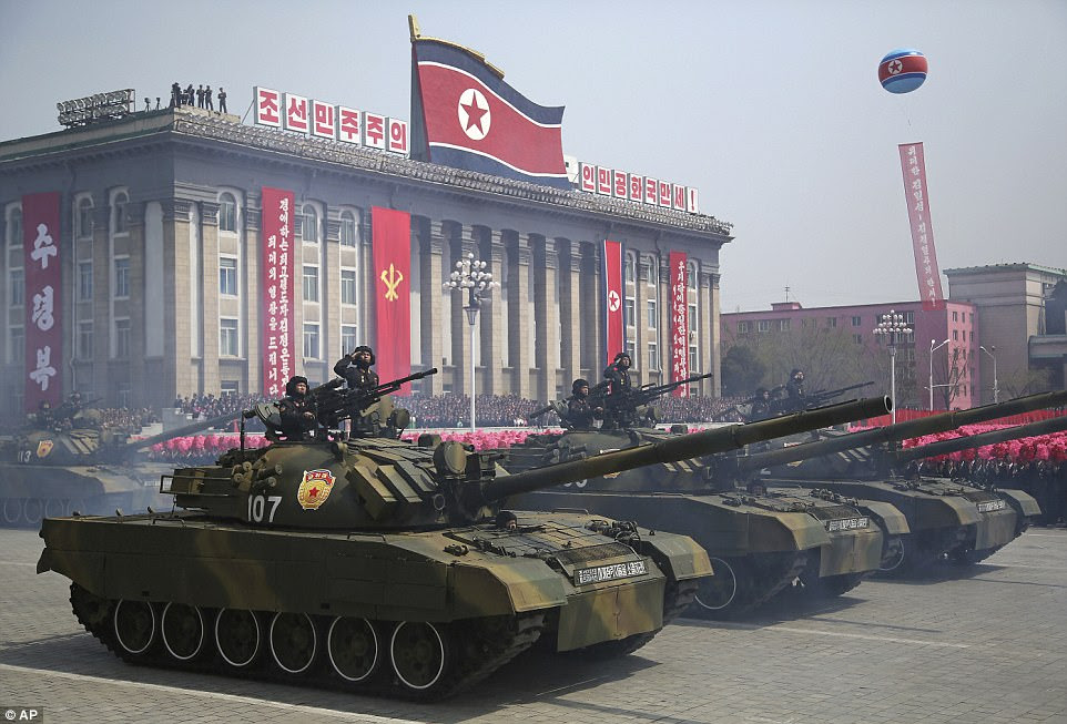 Thousands of North Koreans lined the streets of the capital Pyongyang as soldiers and tanks rolled through to mark the 105th birthday of Kim Jong-un's late grandfather