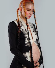 Grimes releases another photo of her bare baby bump amid speculations she's expecting a child with Elon Musk