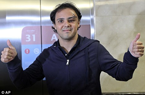 Ferrari driver Felipe Massa arrives at a hospital in Sao Paulo, Brazil, just days after suffering a life-threatening crash during qualifying at the Hungarian Grand Prix