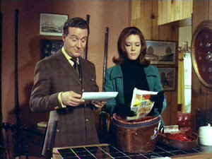 Hey, stop wrinkling it, Mrs. Peel...it's not mint anymore!