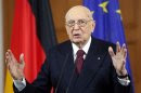 Italy's President Giorgio Napolitano gestures during a news conference following talks with German counterpart Joachim Gauck in Berlin