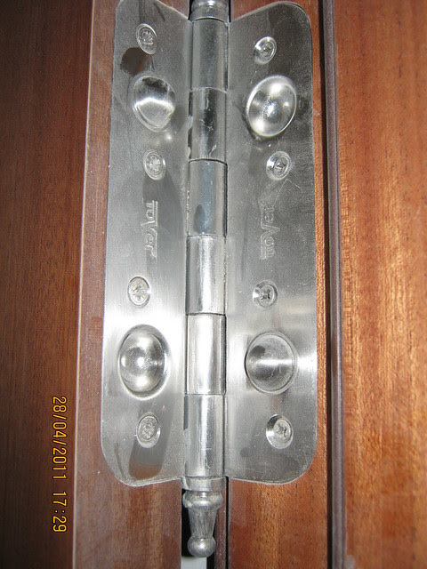 Hinges of the main door in Sangria Towers at Megapolis Hinjewadi Phase 3, Pune