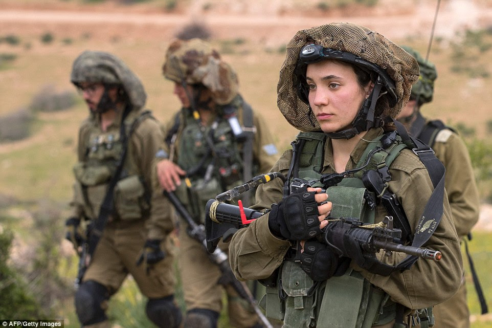Together: The number of female soldiers in the Israeli army is expected to rise by around 1,200 this year with the inauguration of the fourth battalion  