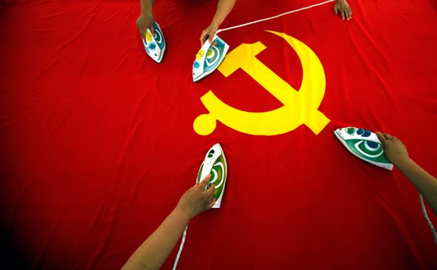 Workers-use-electric-iron-004(Jingong Red Flag Factory, China 2011)