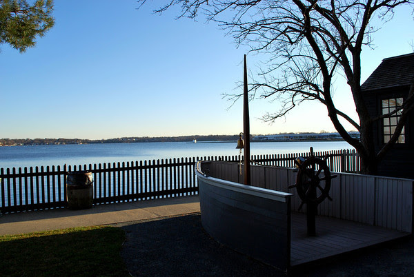 A view from the grounds at the House of the Seven Gables Historic Site towards Derby Wharf in Salem Harbor.