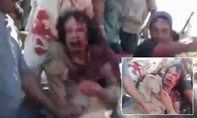 Colonel Gaddafi begs for his life moments before he is executed in video