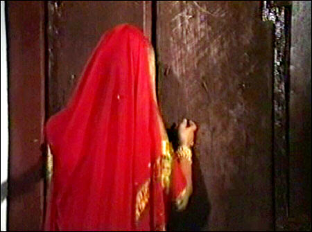 door she devagiri bolts hesitantly amma knock hears goes inside sai peers outside opens