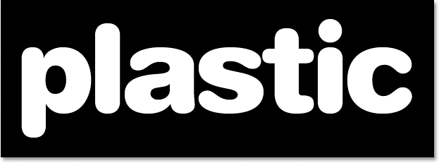 Adobe Photoshop Text Effects: Typing the word 'plastic' into the document.