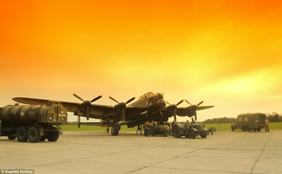 These colour pictures of a WWII Lancaster bomber, air crew and ground crew preparing for a mission