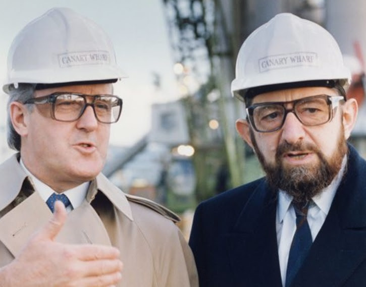 AP FILE - Then Canadian prime minister Brian Mulroney, left, and Paul Reichmann at the job site in 1989 of Olympia & York's vast Canary Wharf project in London.