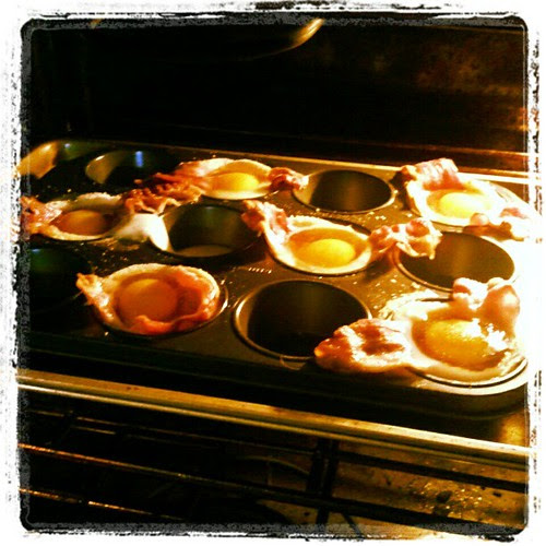 Bacon, Egg & Toast Cups in the oven. Everyone has this pinned on #pinterest right? Anyone else try it yet? #breakfast #marthastewart