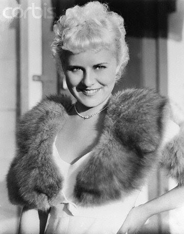 Paulette Goddard Posing in Fur Trimmed Dress Paulette Goddard Posing in Fur Trimmed Dress