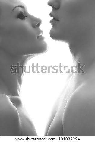 Young and beautiful couple isolated on white - stock photo