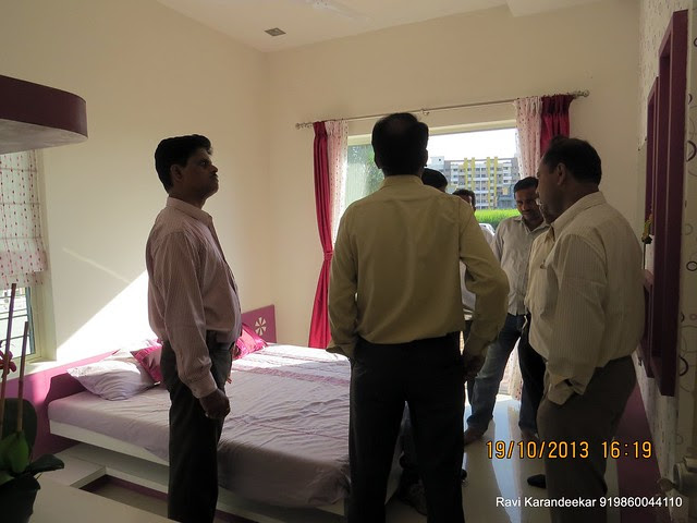 Property Buyers in the Master Bedroom - Visit 2 BHK Show Flat of Vastushodh Projects' UrbanGram Kolhapur, Township of 438 Units of 1 BHK 2 BHK Flats, behind S. P. Office, near Dream World Water Park, Kolhapur 416003 Maharashtra, India
