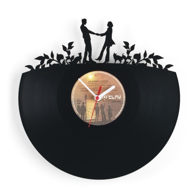Orologi da vecchi dischi di vinile di pavel sidorenko tulipanorosa Orologio da parete particolare