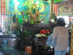 a taiwanese woman worshiping