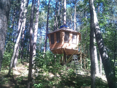 treehouse with wooden ramp