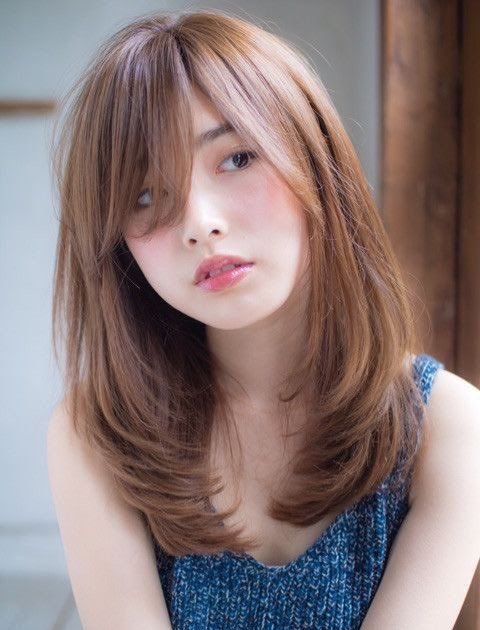 Fesyen Rambut Keriting Pendek Perempuan
