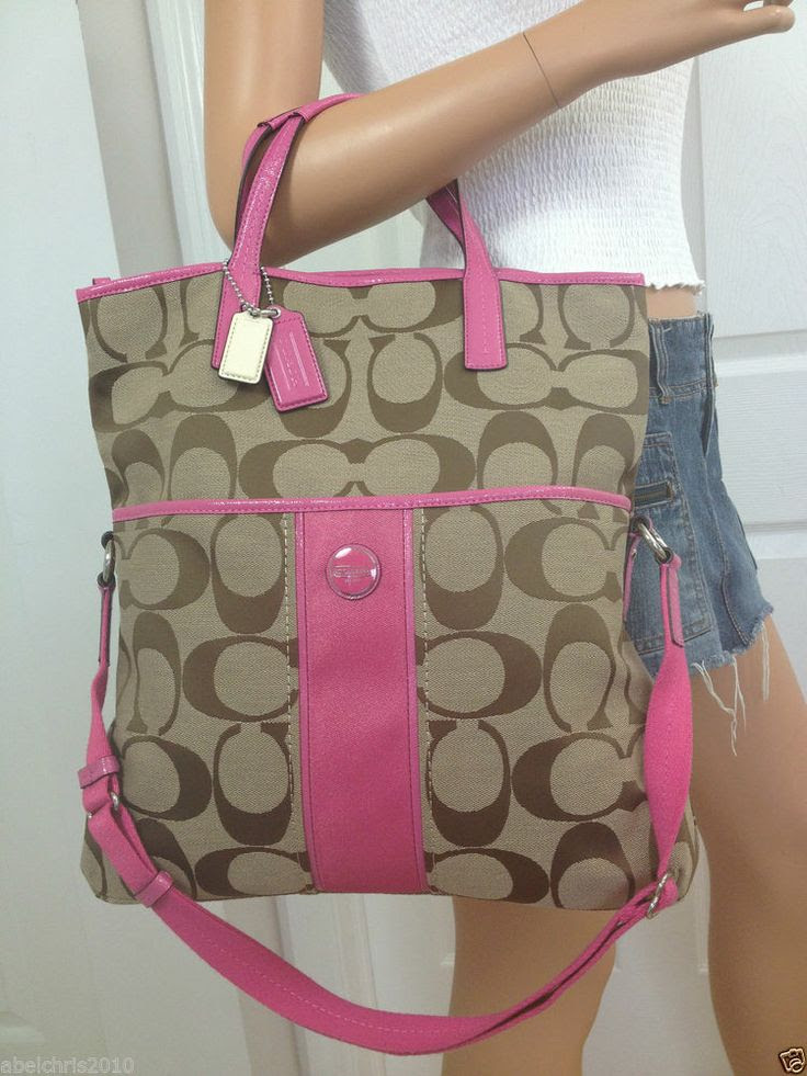 dark brown and pink coach purse