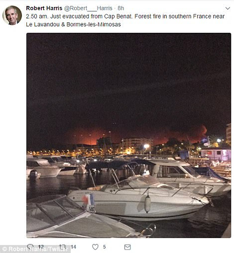 British author Robert Harris posted a series of pictures on Twitter showing fires burning through the undergrowth near Bormes-les-Mimosas