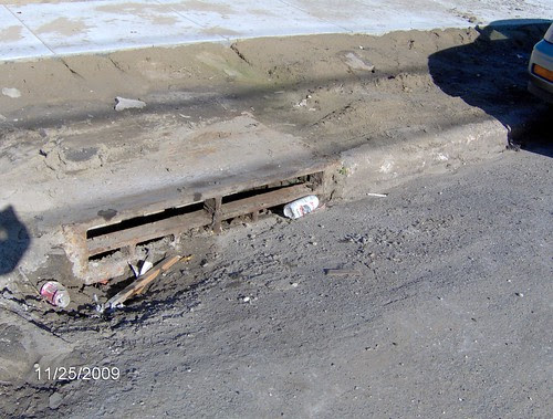 As the drain disappears under the sand from the Church of the Holy Sand Lot