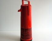 Red vintage 1970s pump flask