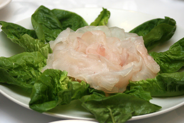 Raw toman fish slices