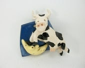 cow jumping over the moon wall piece
