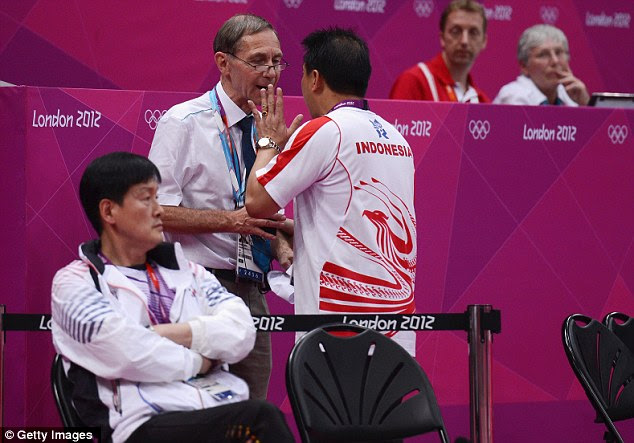Heated: A coach for Indonesia argues with a court official