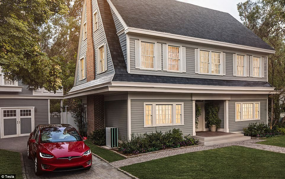 Spot the difference... A home with Tesla's solar roof tiles installed. Tesla has begun selling its eagerly anticipated solar roof tiles, and Elon Musk said the long term goal was for every roof to be solar.