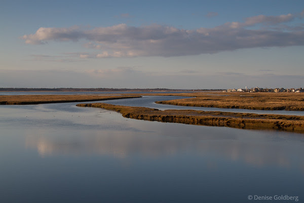 reflections in smooth water, from the bridge to Plum Island in Newburyport, MA