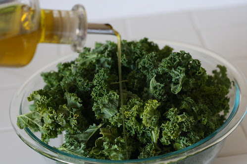 Add olive oil to the kale