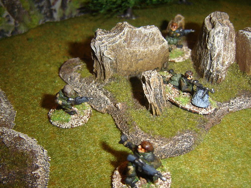 Team 1 moves through rough ground