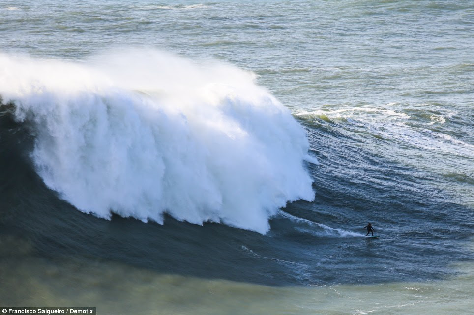 Behind you: GMAC has not only broken the record of largest wave surfed twice, he is also the first person to surf a tidal wave caused by a calving glacier