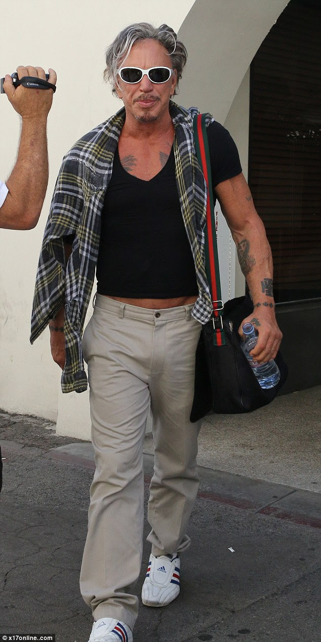 Good pals: Actor Mickey Rourke joined Arnie for lunch but they were not spotted together