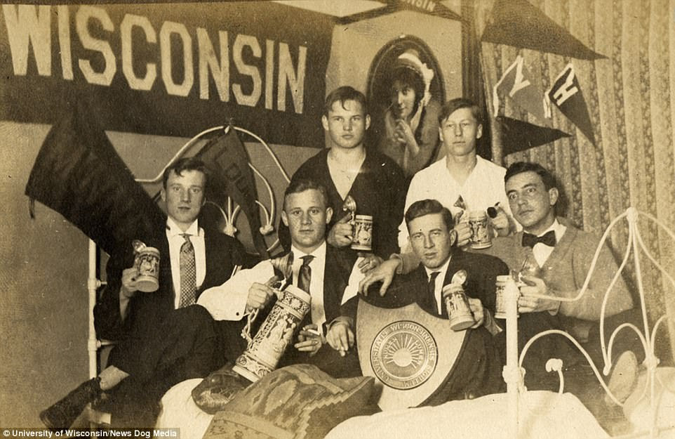 Incredible photos show how little college dorm life has changed in the past century. Frats are notorious for their rowdy parties and drinking, and this photo of fraternity members at the University of Wisonsin, 1909, looking a little glassy-eyed and posing with what appears to be jugs of beer, reveals that reputation goes back a long way