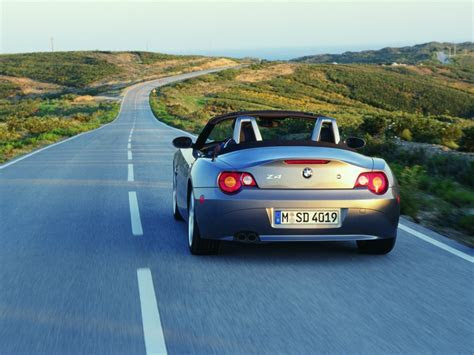 Free Wallpaper: A Blue Benz Sports Car Running On The Road Free Wallpaper World Free Wallpaper: A Blue Benz Sports Car Running On The Road Free Wallpaper World