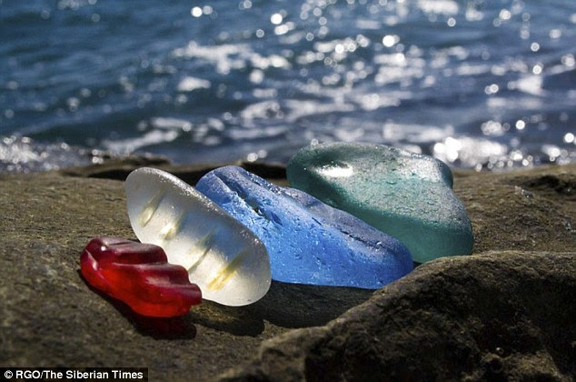The area of the bay has been renamed Glass beach and is sided by dazzling cliffs