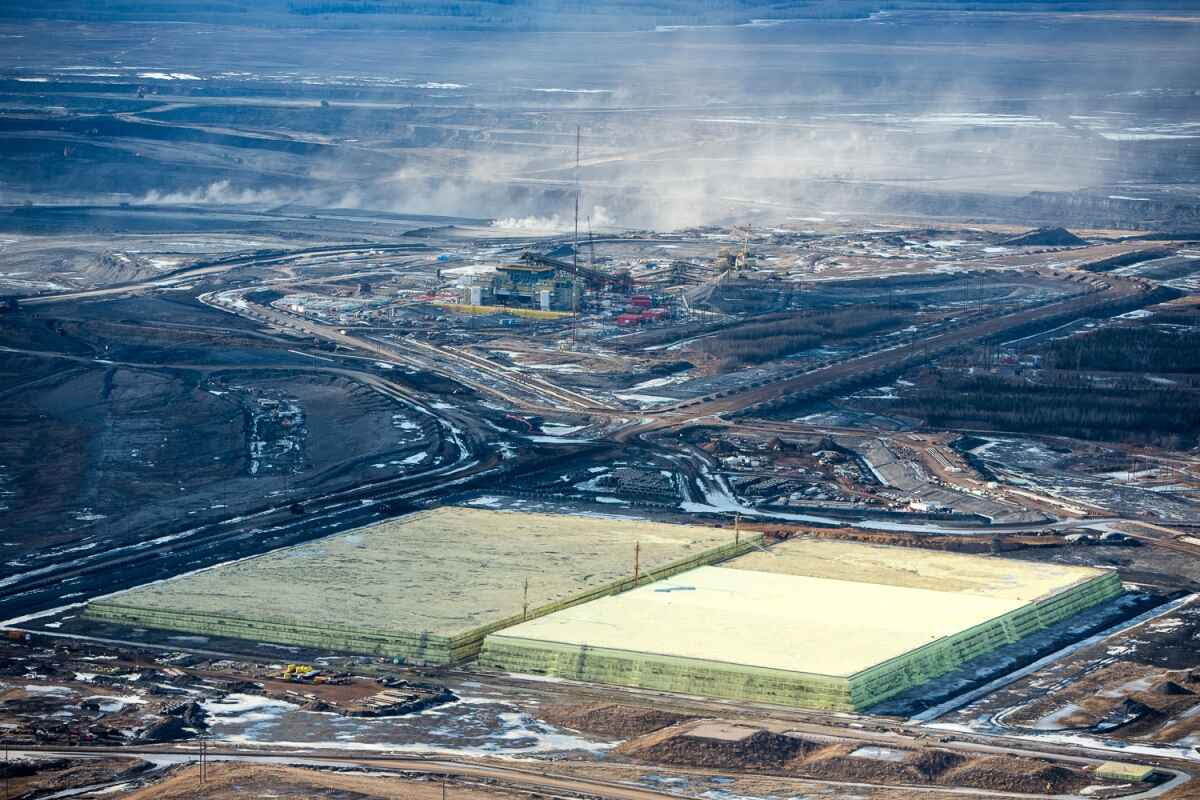 Growing pyramids of sulfur, a byproduct of upgrading bitumen. Mildred Lake, Alberta, Canada.