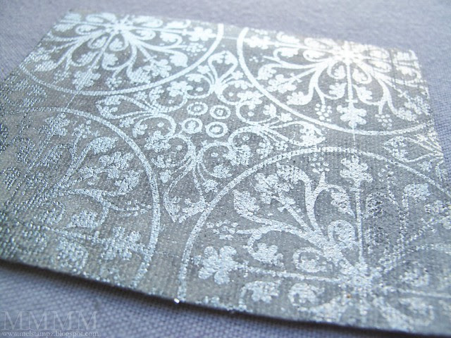 silver leaf on back of sticky back canvas acrylic paint resist HA stamp by Mel Stampz