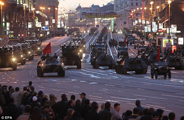 A procession of Russian heavy weapons drive along Tverskaya street in Moscow, Russia, last night, during the rehearsal of the victory day parade