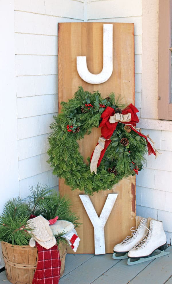 Outside JOY sign. Removable wreath so the sign is usable year after year!