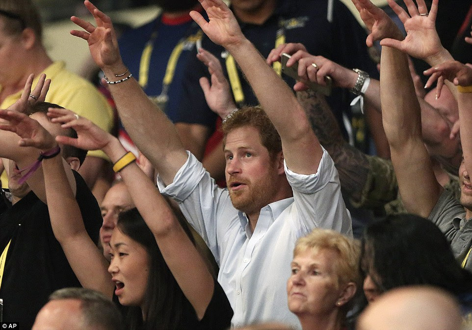 Britain's Prince Harry cheered on the rest of his countrymen during the wheelchair rugby competition event at the Invictus Games