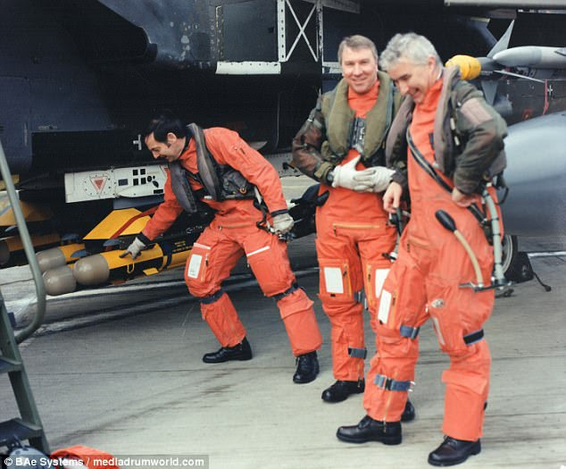 Mr Lewis, centre, a former RAF weapons tester, is pictured with colleagues John Hurrell and Keith Hartley preparing the Brimstone missiles for their first firing